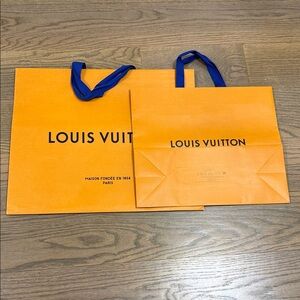 Louis Vuitton Bold Orange shopping Bags with Blue Handles